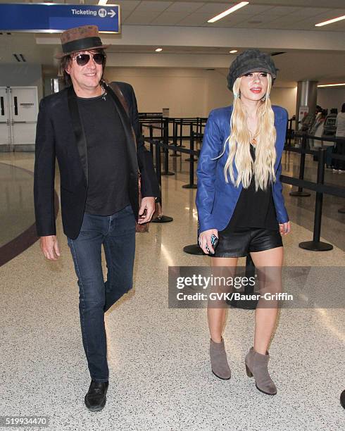 Richie Sambora and Orianthi are seen at LAX on April 08, 2016 in Los Angeles, California.