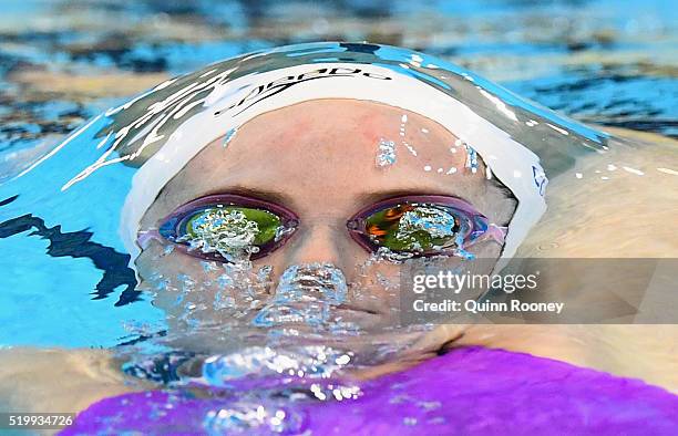 Alicia Coutts of Australia competes in the Women's 200 Metre Individual Medley during day three of the Australian Swimming Championships at the South...