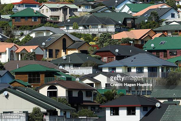 General view of houses in the suburb of Woodridge on April 9, 2016 in Wellington, New Zealand. Increased demand for property in Wellington has seen...