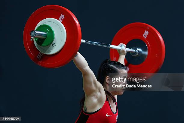 Jennyfer Kang Roberts of the United States competes in the women's 63kg weightlifting competition as a test event for 2016 Rio Olympics at the...