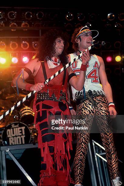 American Rock band Quiet Riot performs onstage at the UIC Pavillion, Chicago, Illinois, November 10, 1984. Pictured are, from left, drummer Frankie...