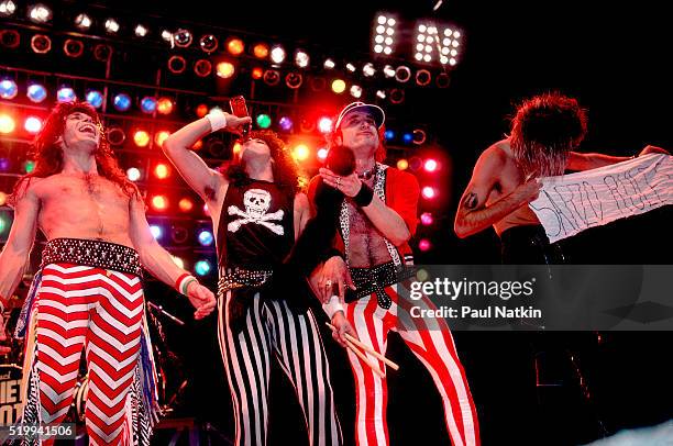American Rock band Quiet Riot performs onstage at Reunion Arena, Dallas, Texas, October 21, 1984. Pictured are, from left, Carlos Cavazo, Frankie...