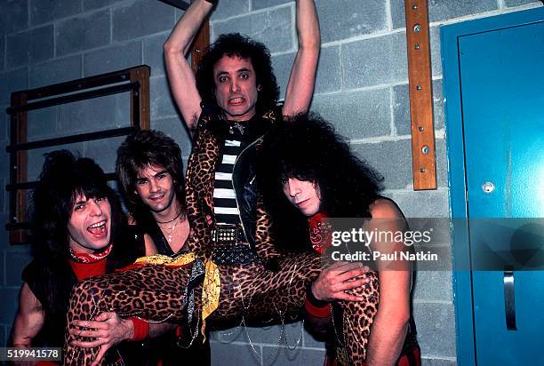 Backstage portrait of American Rock band Quiet Riot at the UIC Pavillion, Chicago, Illinois, November 17, 1983. Pictured are, from left, Rudy Sarzo,...