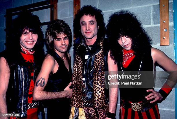 Backstage portrait of American Rock band Quiet Riot at the UIC Pavillion, Chicago, Illinois, November 17, 1983. Pictured are, from left, Rudy Sarzo,...