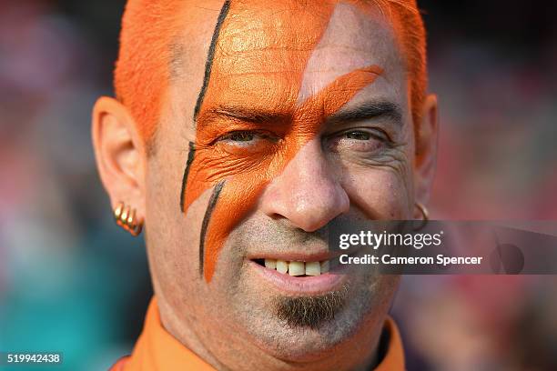 Fan shows his colours during the round three AFL match between the Sydney Swans and the Greater Western Sydney Giants at Sydney Cricket Ground on...