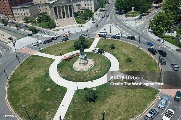 Timothy Boyd, a statue preservation worker in the resource management section of the National Park Service cleans the statue of Maj General George H....