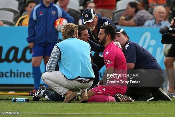 Paul Izzo goalkeeper for the Mariners is injured during the round 27 A-League match between the Central Coast Mariners and the Newcastle Jets at...