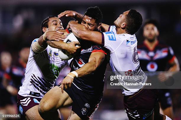 Roger Tuivasa-Sheck of the Warriors is tackled by Steve Matai of the Sea Eagles and Dylan Walker of the Sea Eagles during the round six NRL match...