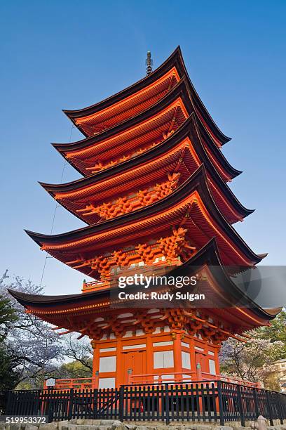 pagoda at itsukushima jinja shrine - itsukushima shrine stock pictures, royalty-free photos & images