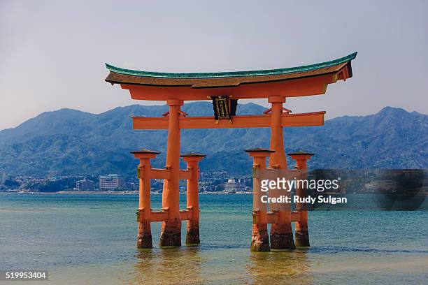 miyajima great torii gate at itsukushima jinja shrine - torii gate stock pictures, royalty-free photos & images