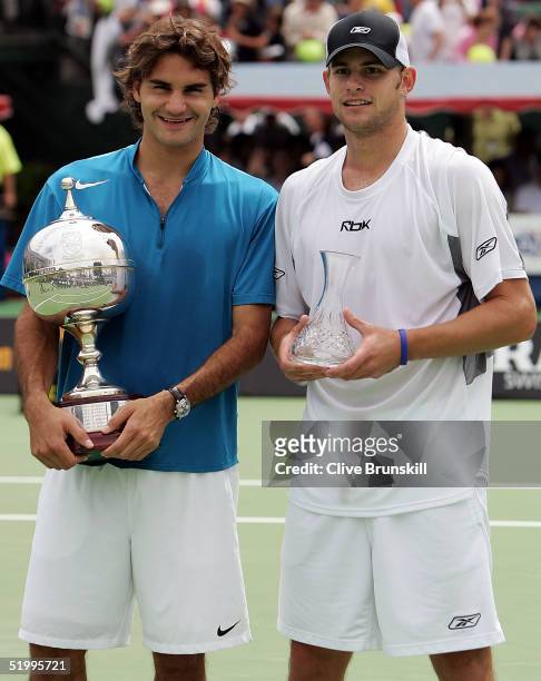 Roger Federer of Switzerland and Andy Roddick of the United States pose for a photo after the final of the 2005 Kooyong Classic at Kooyong Lawn...