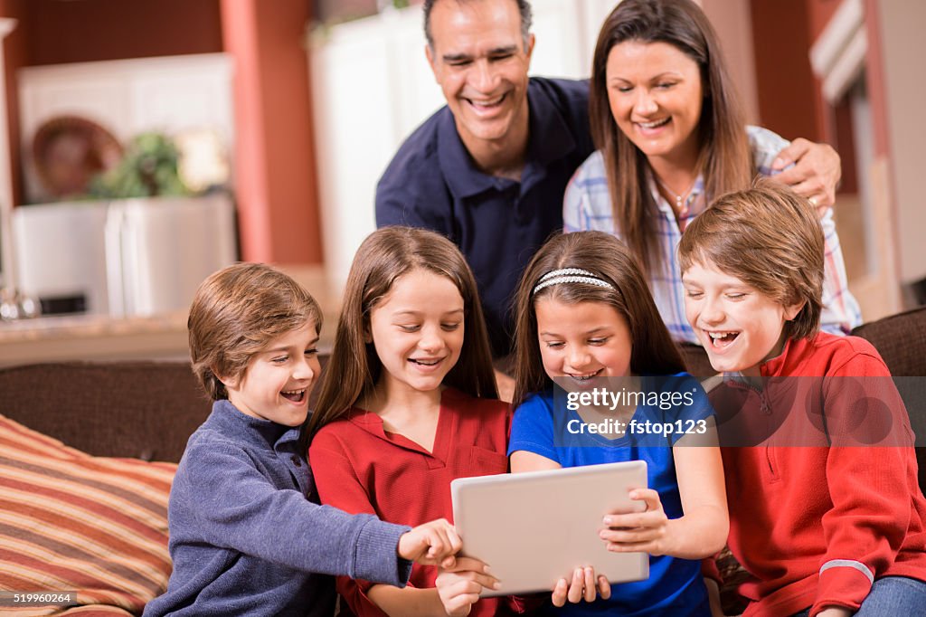 Family Using Digital Technology Family Using Digital Tablet At Home Children Parents Technology High ...