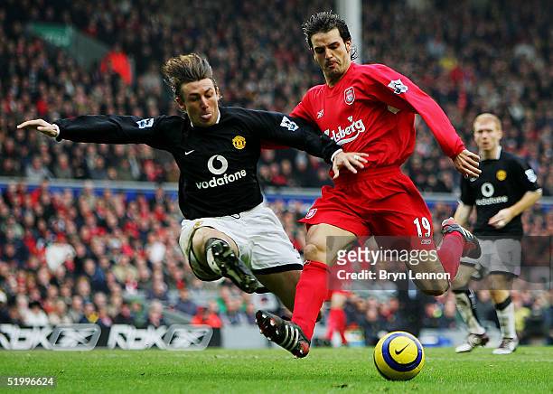 Gabriel Heinze of of Manchester United tackles Fernando Morientes of Liverpool during the Barclays Premiership match between Liverpool and Manchester...