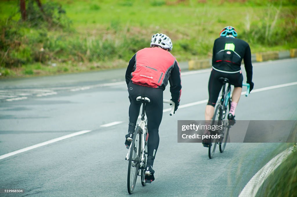 Cyclists on a country road.
