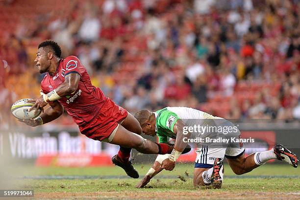 Samu Kerevi of the Reds looks to pass during the round seven Super Rugby match between the Reds and the Highlanders at Suncorp Stadium on April 9,...