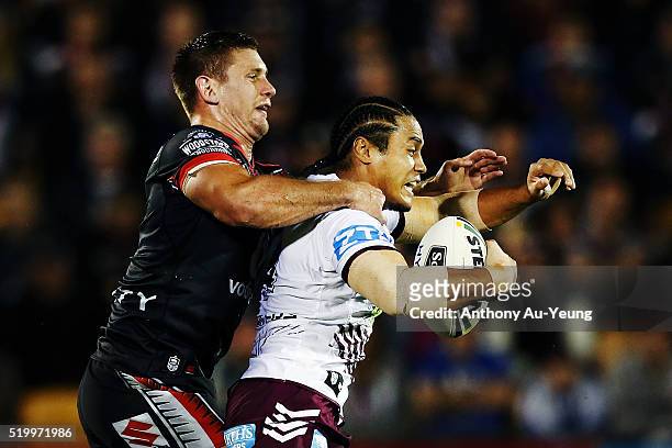Steve Matai of the Sea Eagles is tackled by Jacob Lillyman of the Warriors during the round six NRL match between the New Zealand Warriors and the...