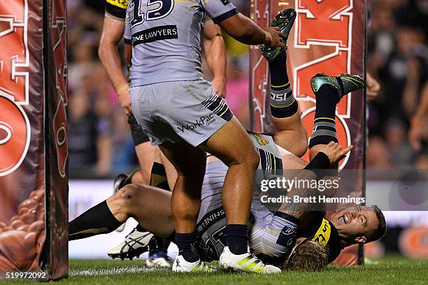 Trent Merrin of the Panthers scores a try during the round six NRL match between the Penrith Panthers and the North Queensland Cowboys at Pepper...