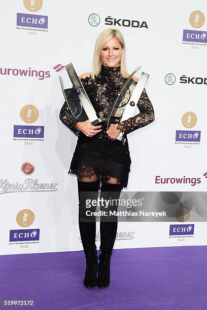 Helene Fischer poses with her awards at the winners board during the Echo Award 2016 on April 7, 2016 in Berlin, Germany.