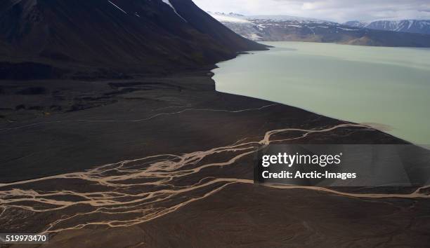 streams leading to lake hvitarvatn - langjokull stock pictures, royalty-free photos & images