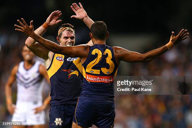 Luke Shuey and Lewis Jetta of the Eagles celebrate a goal during the round three AFL match between the West Coast Eagles and the Fremantle Dockers at...