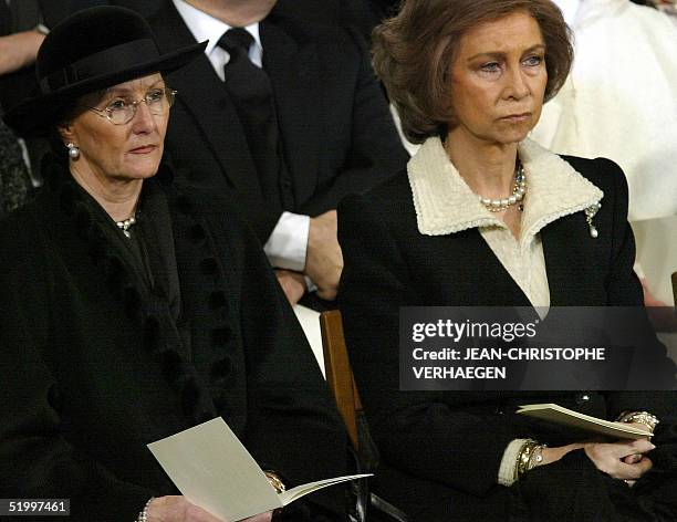 Queen Sonia of Norway and Queen Sophia of Spain listen to a sermon during the funeral of Luxembourg Grand Duchess Josephine-Charlotte in the Notre...