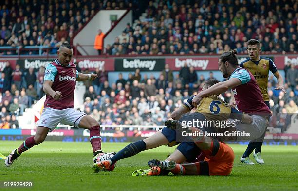 Dimitri Payet of West Ham United scores a goal which was disallowed for a foul by Andy Carroll of West Ham on Laurent Koscielny of Arsenal during the...