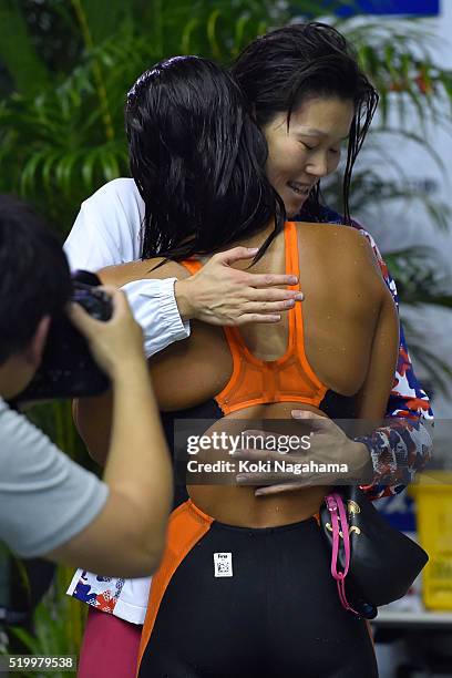 Rie Kaneto celebrates with Kanako Watanabe after the Women's 200m Breaststroke final during the Japan Swim 2016 at Tokyo Tatsumi International...