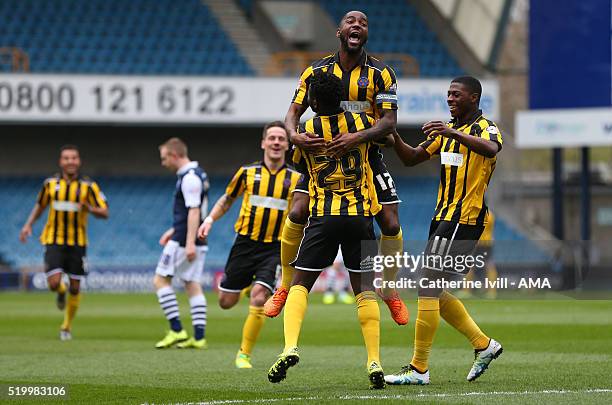 Larnell Cole of Shrewsbury Town celebrates after he scores a goal to make it 0-1 with Abu Ogogo and Sullay Kaikai of Shrewsbury Town during the Sky...