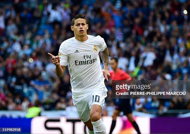 Real Madrid's Colombian midfielder James Rodriguez celebrates a goal during the Spanish league football match Real Madrid CF vs SD Eibar at the...