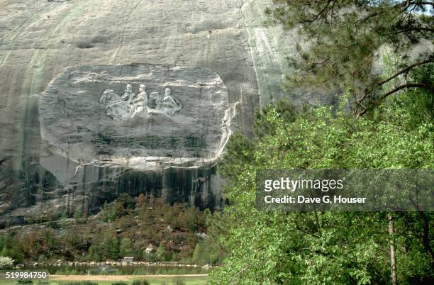 bas-relief carving of confederate heroes - stone mountain stock pictures, royalty-free photos & images