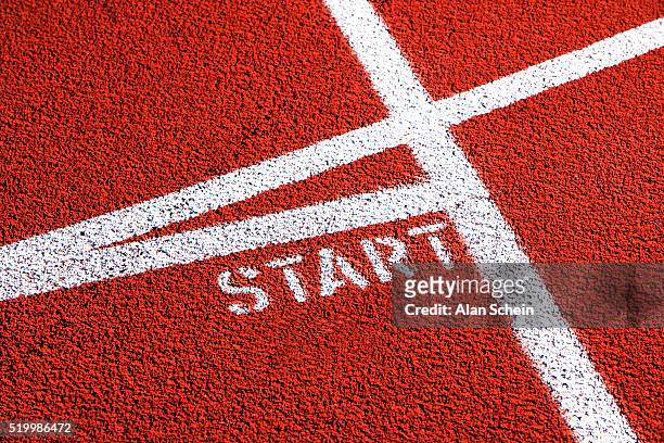 starting line on running track - スタートライン ストックフォトと画像