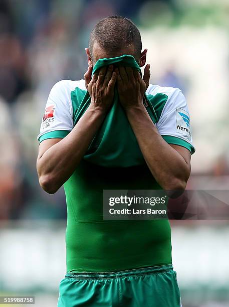 Alexandro Galvez of Bremen looks dejected after loosing the Bundesliga match between Werder Bremen and FC Augsburg at Weserstadion on April 9, 2016...