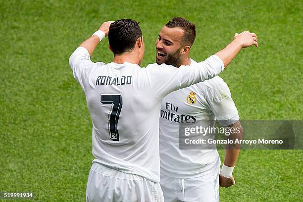 Cristiano Ronaldo of Real Madrid CF celebrates scoring their third goal with teammate Jese Rodriguez during the La Liga match between Real Madrid CF...