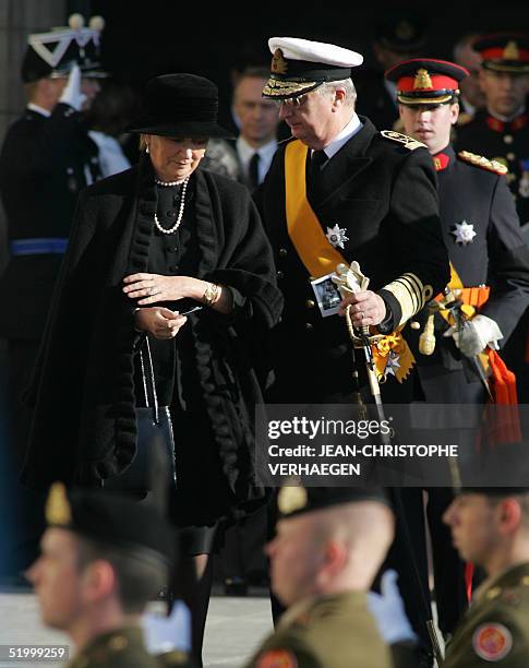 Belgian King Albert II, stands next to Queen Paola during the funeral of his sister, Luxembourg Grand Duchess Josephine Charlotte, in Notre Dame de...
