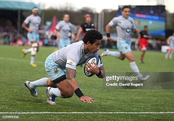 Ken Pisi of Northampton dives to score the first try duirng the European Rugby Champions Cup quarter final match between Saracens and Northampton...