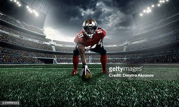 アメリカンアメリカンフットボール - アメリカンフットボールラインマン ストックフォトと画像
