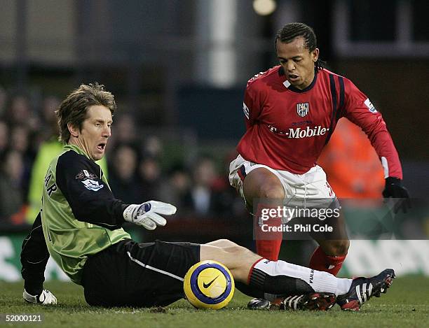 Edwin Van Der Sar, the Fulham goalie, denies WBA's Robert Earnshaw a goal during the Barclays Premiership match between Fulham and West Bromwich...