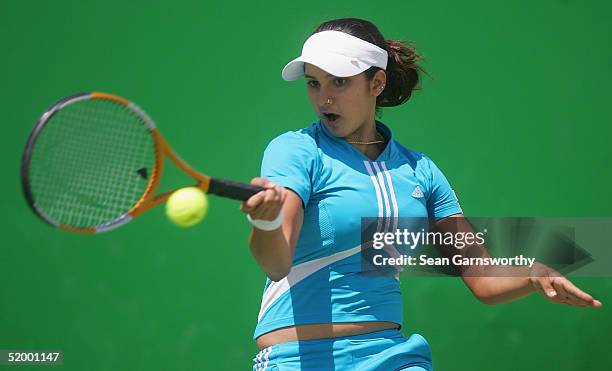 Sania Mirza of India in action against Cindy Watson of Australia during day one of the Australian Open Grand Slam at Melbourne Park January 17, 2005...