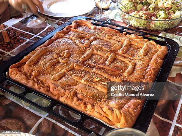 empanada, a typical dish from galicia - tuna fish cakes stock pictures, royalty-free photos & images