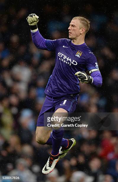 Joe Hart of Manchester City celebrates the goal scored by Samir Nasri of Manchester City during the Barclays Premier League match between Manchester...