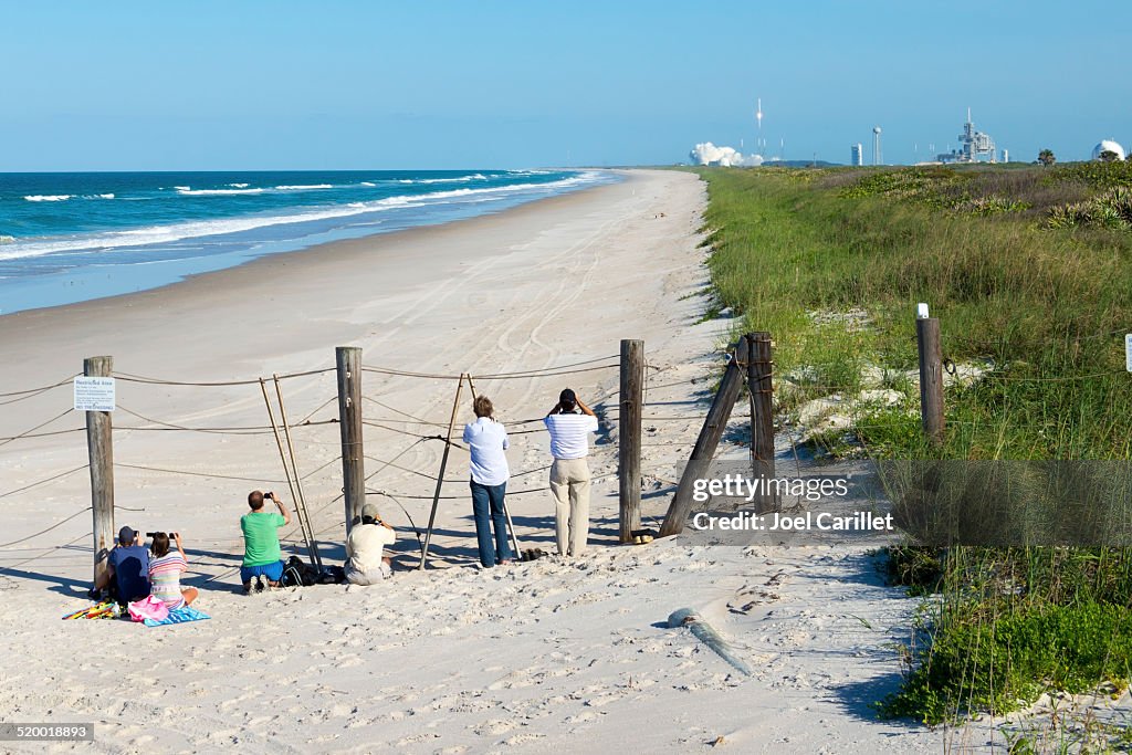 People watching rocket launch at Canaveral National Seashore