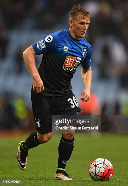 Matt Ritchie of Bournemouth runs with the ball during the Barclays Premier League match between Aston Villa and A.F.C. Bournemouth at Villa Park on...