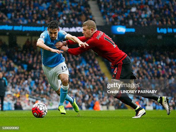 West Bromwich Albion's Irish midfielder James McClean vies with Manchester Citys Spanish midfielder Jesus Navas during the English Premier League...