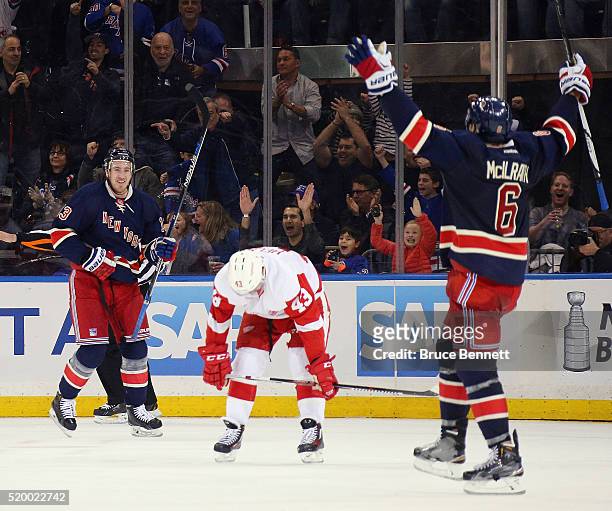 Darren Helm of the Detroit Red Wings reacts as the New York Rangers celebrate a third period goal by Kevin Hayes against the Detroit Red Wings at...