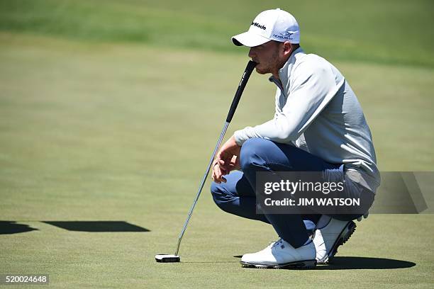 Golfer Daniel Berger lines up a shot on the 2nd green during Round 3 of the 80th Masters Golf Tournament at the Augusta National Golf Club on April 9...