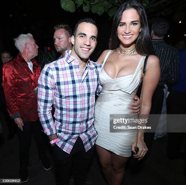 Cuban-American gymnast Danell Leyva and Leonor Barrios pose during the VIP Reception at the W South Beach as part of the 8th annual Miami Beach Gay...