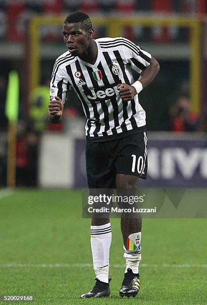 Paul Pogba of Juventus FC celebrates his goal during the Serie A match between AC Milan and Juventus FC at Stadio Giuseppe Meazza on April 9, 2016 in...