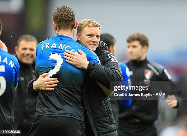 Eddie Howe manager / head coach of Bournemouth embraces Simon Francis of Bournemouth at full-time during the Barclays Premier League match between...
