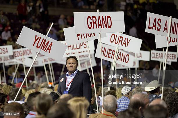 Guy Short, a delegate from Colorado, stands on the floor before Senator Ted Cruz, a Republican from Texas and 2016 presidential candidate, not...