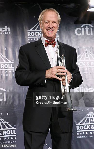 Inductee Lee Loughnane of Chicago poses in the press room at the 31st Annual Rock And Roll Hall Of Fame Induction Ceremony at Barclays Center of...